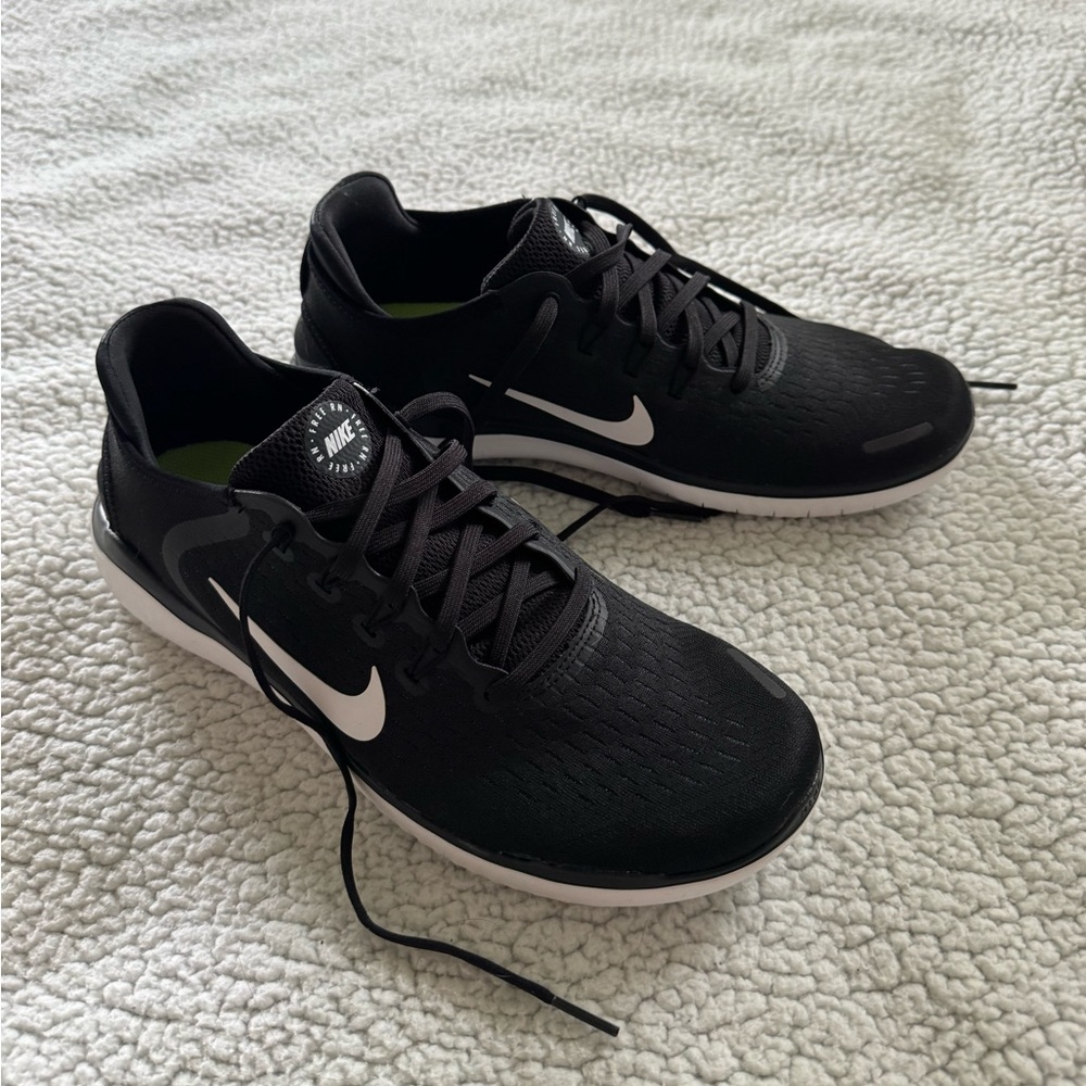Nike Women's Black Running Sneakers with White Swoosh
